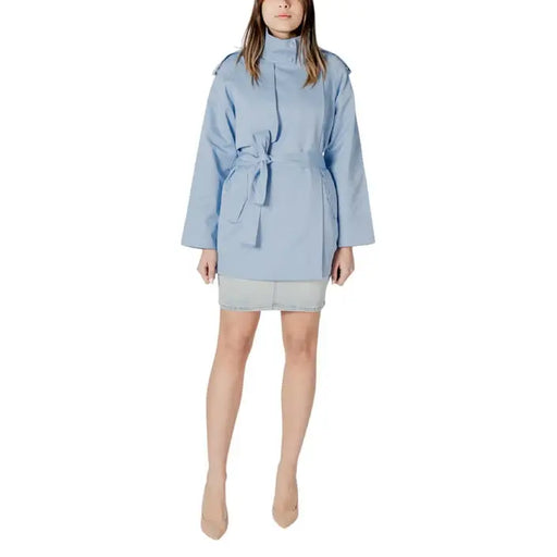 Light blue belted trench coat showcased in Women’s Belted Sage Green Trench Coat product image
